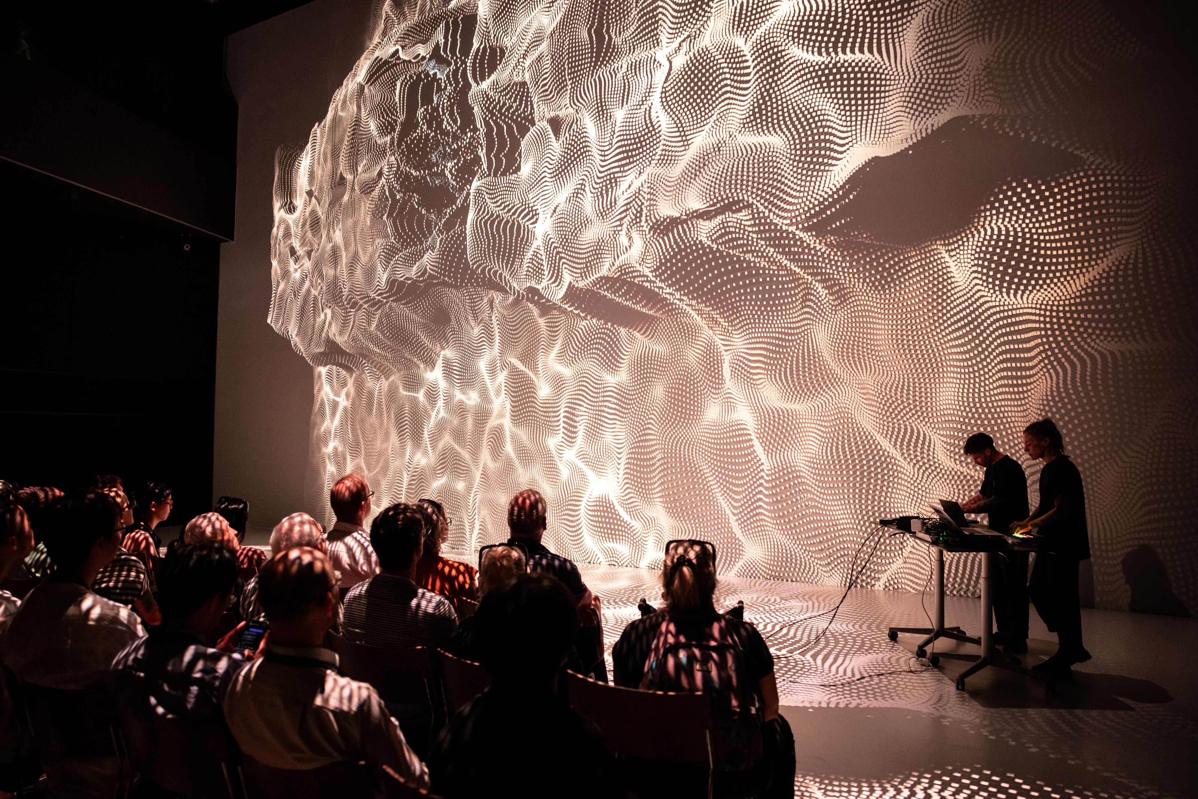 Photo of the performance 'OnTransform' by Arno Deutschbauer (AT) and Melanie Daveid (AT) at the Futurelab Night 2024