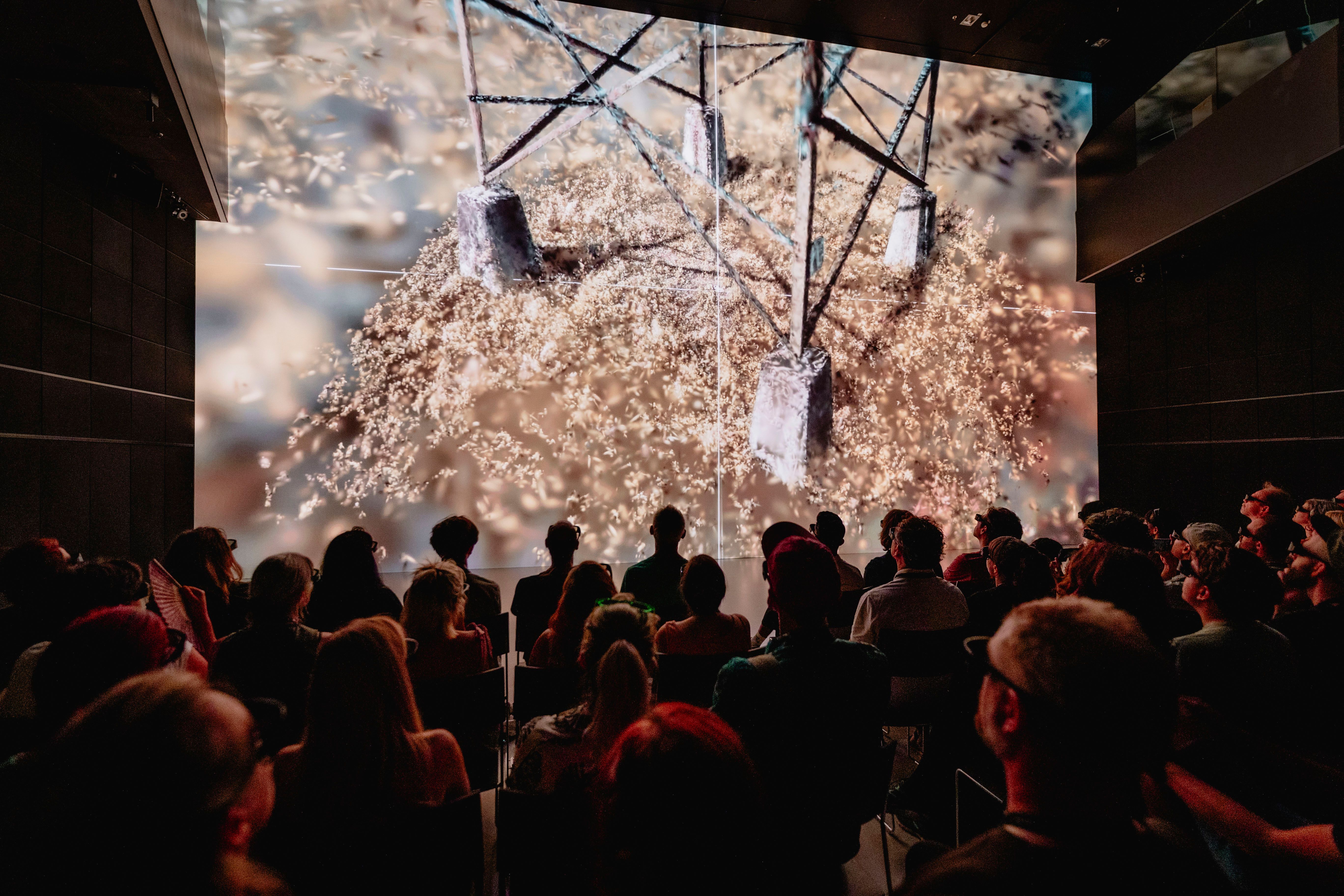 Photo of the screening of 'Persistent Time-Sync Resonance' by Johannes Pöll (AT) and Raphael Schaumbug-Lippe (AT) at the Futurelab Night 2024